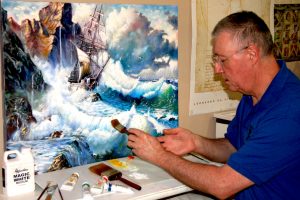 Tom Anderson at work on a large seascape.