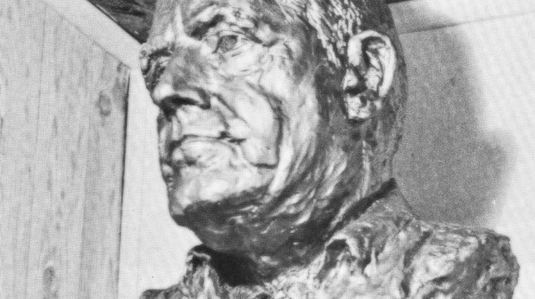 photo of wooden sculpture of Bill created by George Rammel, one of the students at Aldergrove